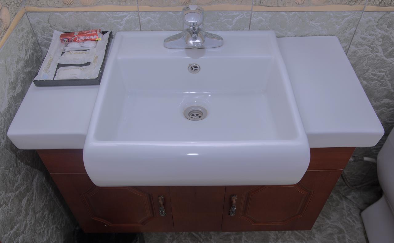 Rising Sun Hotel Дар ес Саалам Екстериор снимка
